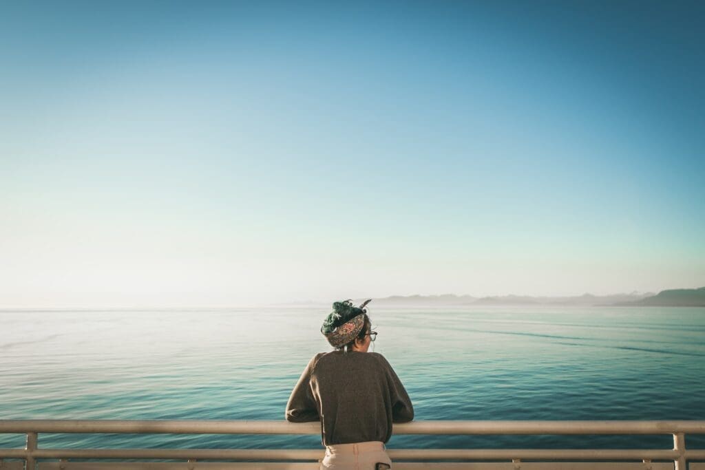 woman looking at ocean