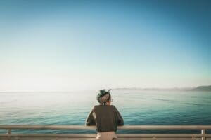 woman looking at ocean